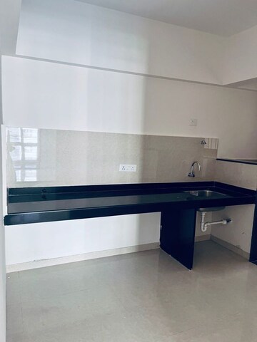 Kitchen in 3 BHK Apartment at Kohinoor Viva City, Dhanori – for Rent