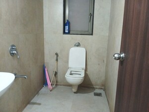 Bathroom in 2 BHK Apartment at Runwal Eirene, Balkum Pada – for Rent