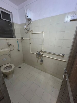 Bathroom in 1 BHK Apartment at Lokpuram CHS, Vasant Vihar – for Rent