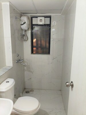 Bathroom in 1 BHK Apartment at Runwal Gardens Phase 2, Dombivli East – for Rent