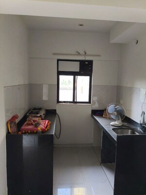 Kitchen in 1 BHK Apartment at Runwal Gardens Phase I, Dombivli East – for Rent