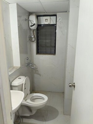 Bathroom in 2 BHK Apartment at Runwal Gardens Phase I, Dombivli East – for Rent