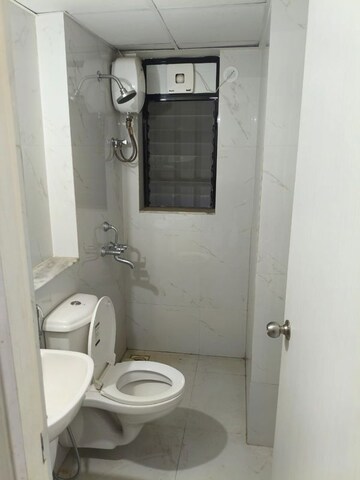 Bathroom in 2 BHK Apartment at Runwal Gardens Phase I, Dombivli East – for Rent