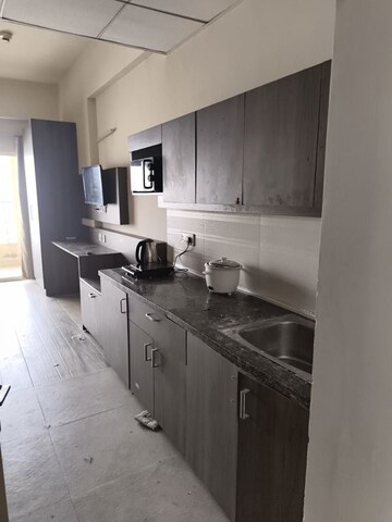 Kitchen in 1 RK Apartment at Paramount Oak, Zeta I Greater Noida – for Rent