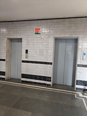 Building Lobby in 2 BHK Apartment at Ansal Sushant Apartments, Sushant Lok I – for Rent