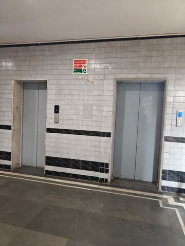 Building Lobby in 2 BHK Apartment at Ansal Sushant Apartments, Sushant Lok I – for Rent