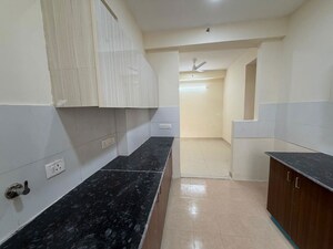 Kitchen in 2 BHK Apartment at Amrapali Heartbeat City, Sector 107 – for Rent
