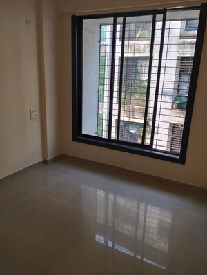 Living Room in 2 BHK Apartment at Bhargavi CHS, Kasheli – for Rent