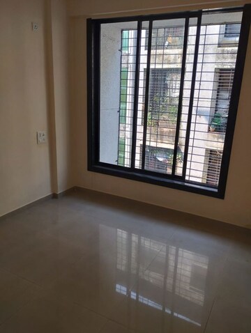 Living Room in 2 BHK Apartment at Bhargavi CHS, Kasheli – for Rent