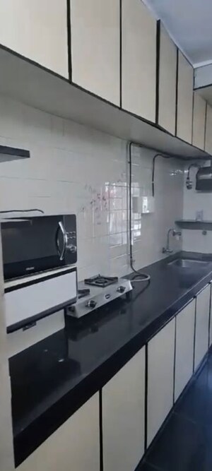 Kitchen in 2 BHK Apartment at Dadar West – for Rent