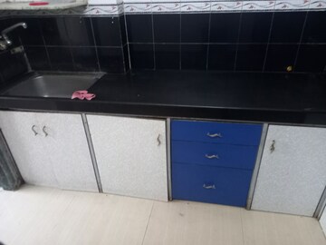 Kitchen in 1 BHK Apartment at Thakur Gayatri Satsang, Kandivali East – for Sale