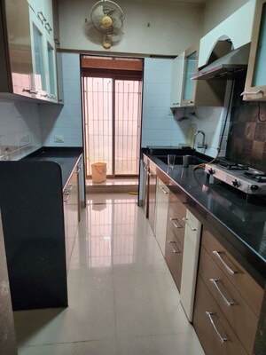 Kitchen in 1.5 BHK Apartment at Waghbil – for Rent