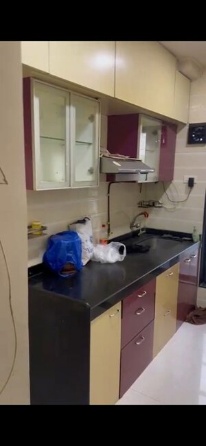 Kitchen in 1 BHK Apartment at Umang S N Sahayog CHSL, Goregaon West – for Rent