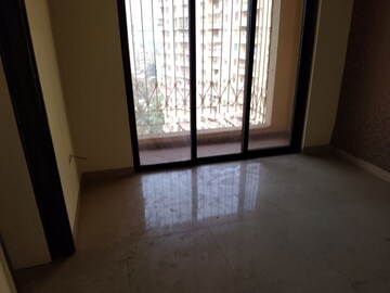 Room in 1 BHK Apartment at Tharwani Rosalie, Kalyan West – for Rent