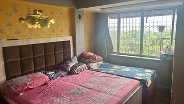 Bedroom in 2 BHK Apartment at Yogi Palace CHS, Borivali West – for Sale