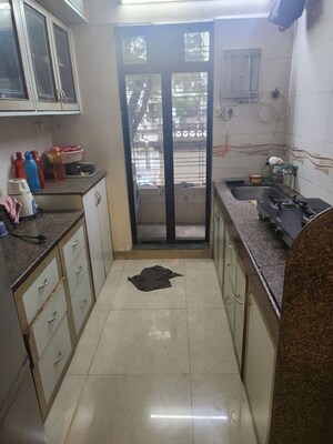 Kitchen in 2 BHK Apartment at Manorath CHS Borivali, Borivali West – for Sale
