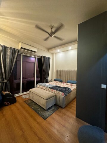 Bedroom in 3 BHK Builder Floor at Ansal API Esencia, Sector 67 – for Rent
