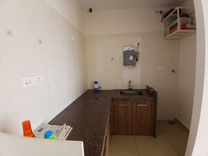 Kitchen in 1 BHK Apartment at Duville Riverdale Suites, Kharadi – for Rent