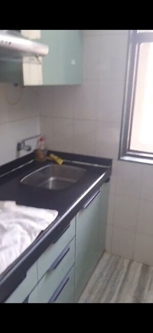 Kitchen in 3 BHK Apartment at Gemstar Nestle Apartments, Malad West – for Rent