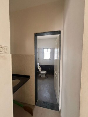 Bathroom in 2 BHK Apartment at G K Daffodils Housing Society, Pimple Saudagar – for Rent