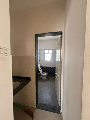 Bathroom in 2 BHK Apartment at G K Daffodils Housing Society, Pimple Saudagar – for Rent