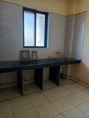 Kitchen in 2 BHK Apartment at Madhusudan Retreat, Murbad – for Sale