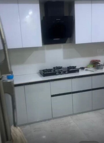 Kitchen in 3 BHK Apartment at Uninav Eden, Raj Nagar Extension – for Sale