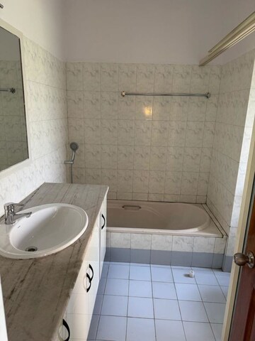 Bathroom in 3 BHK Apartment at Brigade Palace, Palace Road – for Rent