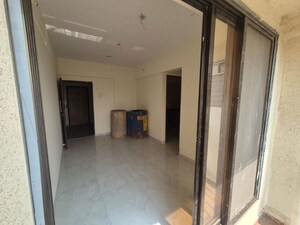 Building Lobby in 1 BHK Apartment at Uma Ananta, Kharghar Sector 11 – for Sale