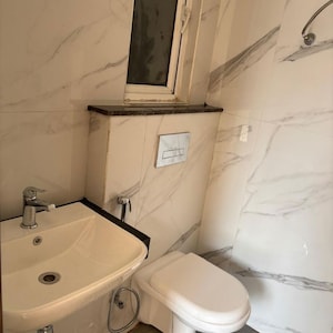 Bathroom in 3.5 BHK Builder Floor at M3M Soulitude, Sector 89 – for Sale