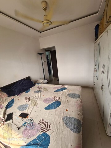 Bedroom in 2 BHK Apartment at Swaraj Bella Vista, Ghansoli – for Rent