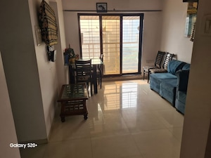Living Room in 2 BHK Apartment at Swaraj Bella Vista, Ghansoli – for Rent