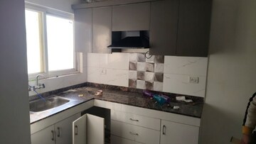 Kitchen in 2 BHK Apartment at Pivotal Riddhi Siddhi, Sector 99 – for Rent