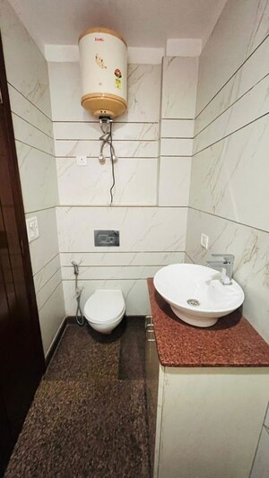 Bathroom in 2 BHK Builder Floor at Kalkaji – for Rent