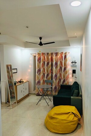 Living Room in 2 BHK Apartment at Dosti West County, Balkum Pada – for Rent