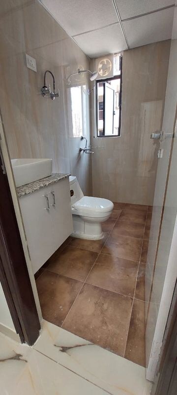 Bathroom in 3 BHK Apartment at SVP Gulmohur Garden Phase 2, Raj Nagar Extension – for Sale