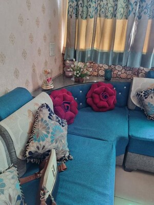 Living Room in 2 BHK Apartment at Amrapali Golf Homes, Sector 4 Greater Noida – for Sale