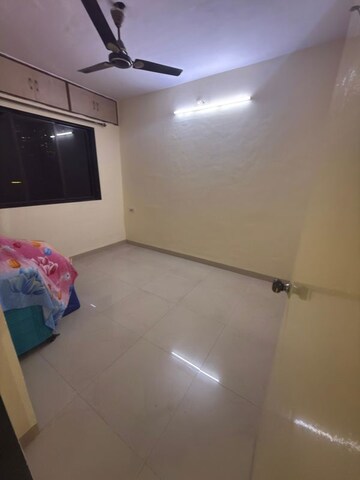 Room in 2 BHK Apartment at Indravihar CHS, Kopar Khairane – for Rent