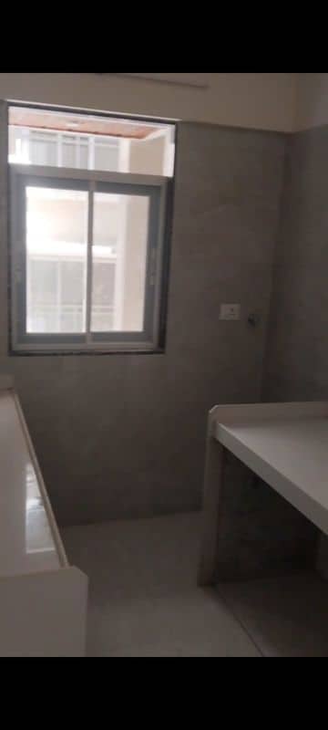 Kitchen in 2 BHK Apartment at Adarsh Nagar – for Sale