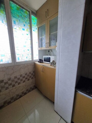 Kitchen in 2 BHK Apartment at Amrapali Dream Valley, Tech Zone 4 Greater Noida – for Sale