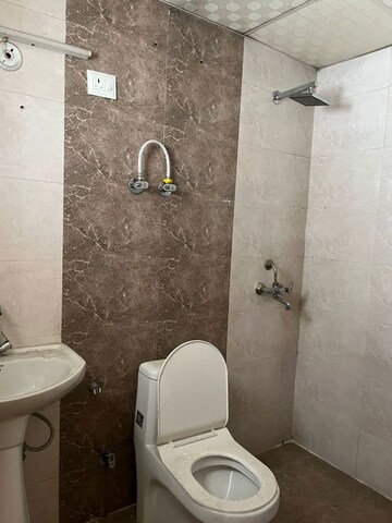 Bathroom in 2 BHK Apartment at Vasundhara Sector 9 – for Sale