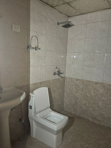 Bathroom in 2 BHK Apartment at Vasundhara Sector 9 – for Sale