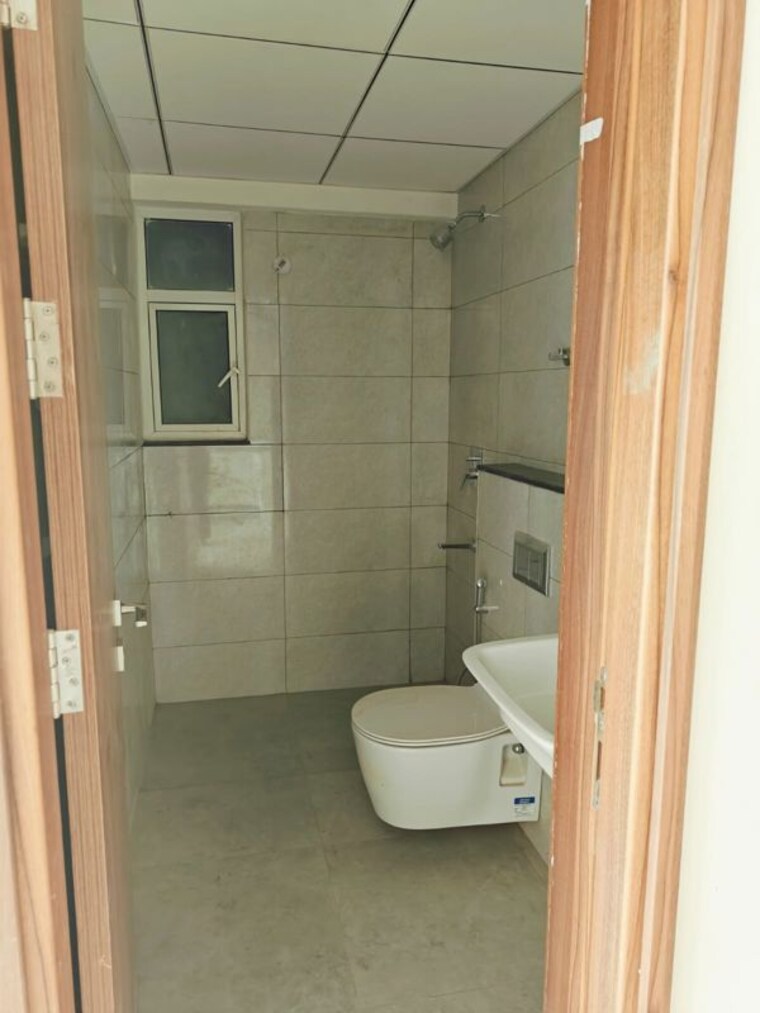 Bathroom, ar-domain 3 Bedroom 681 Sq.Ft. Apartment In Morta Ghaziabad 9902568