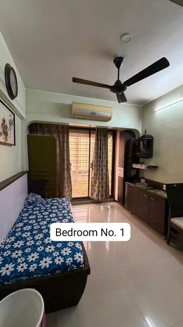 Living Room in 2 BHK Apartment at Borivali East – for Sale