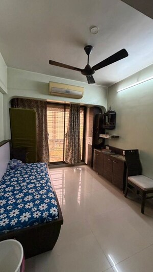 Living Room in 2 BHK Apartment at Borivali East – for Sale