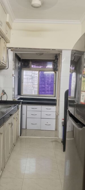 Kitchen in 3.5 BHK Apartment at Nirmal Lifestyle Residency CHS Ltd, Mulund West – for Rent
