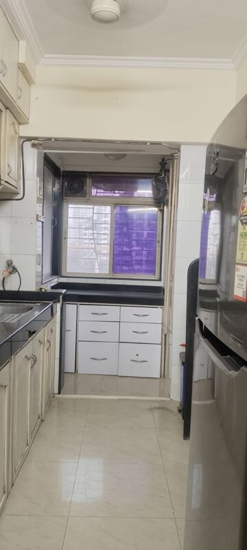 Kitchen in 3.5 BHK Apartment at Nirmal Lifestyle Residency CHS Ltd, Mulund West – for Rent