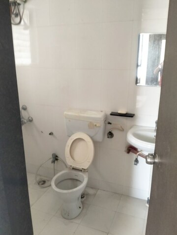 Bathroom in 3 BHK Apartment at Manikchand Malabar, Lulla Nagar – for Rent