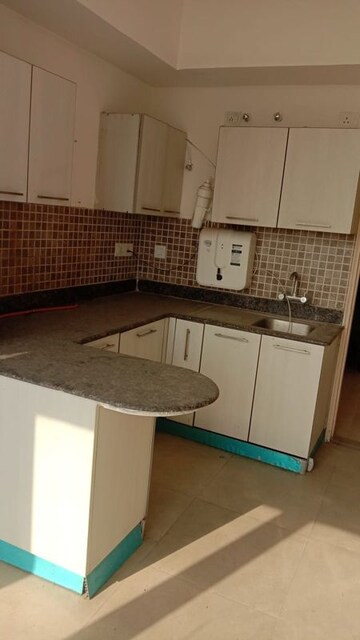 Kitchen in 2 BHK Apartment at Jaypee Greens Pavilion Court, Sector 128 – for Rent