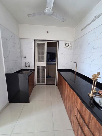 Kitchen in 2 BHK Apartment at Prasun Sarvam, Kharadi – for Rent